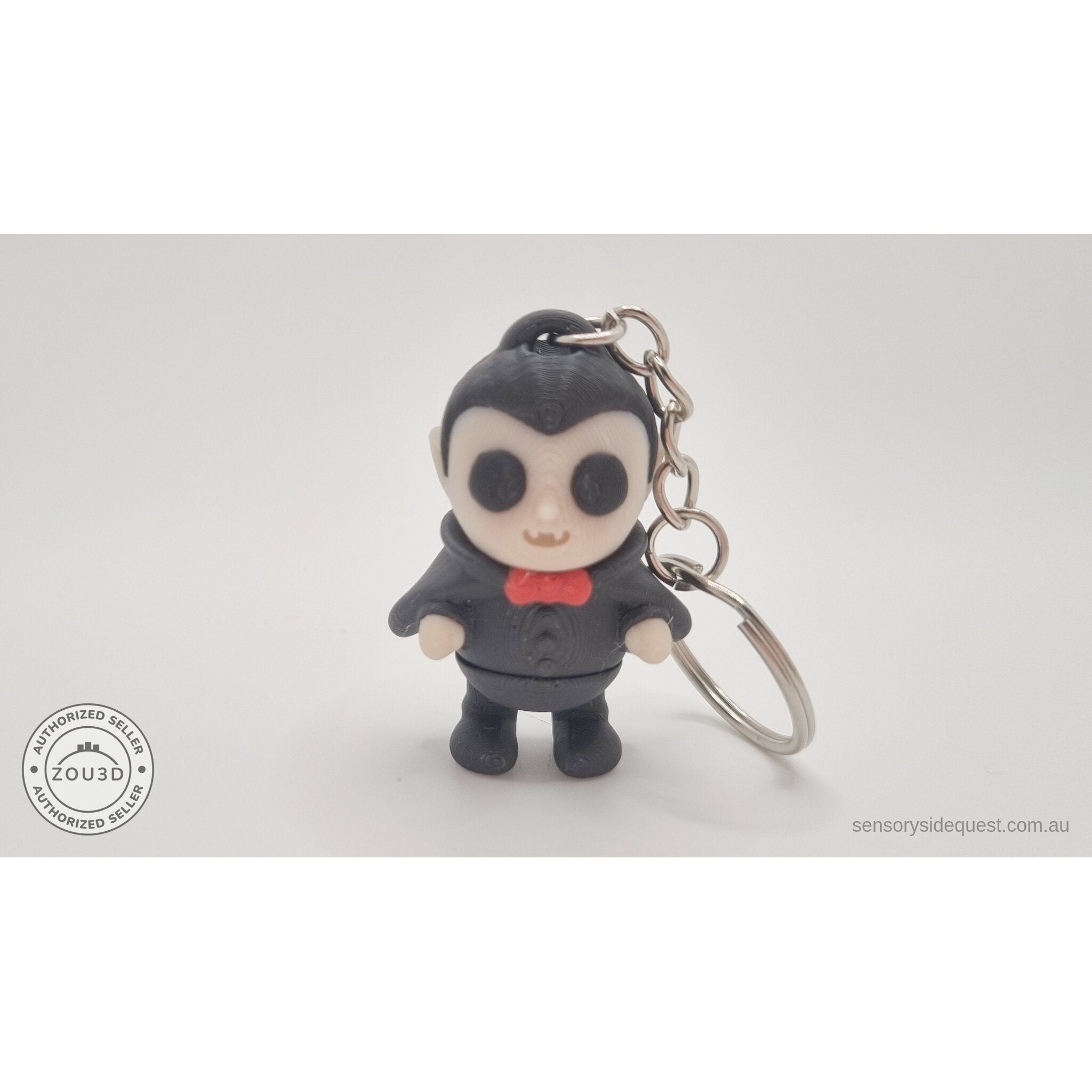 Tiny Dracula keychain variant — front view showing full figure and key ring, own photo by Sensory Sidequest