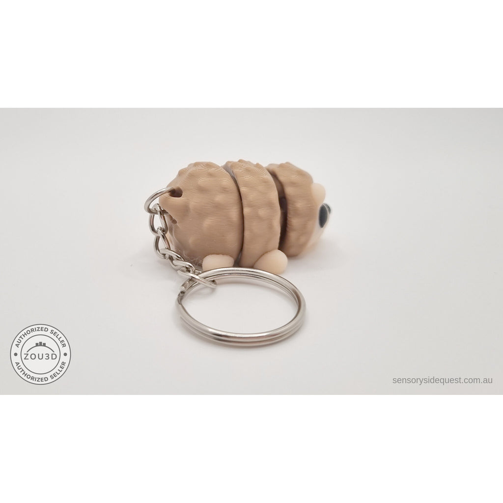 Baby Hedgehog keychain articulated toy — back view showing ring and chain detail, own photo by Sensory Sidequest