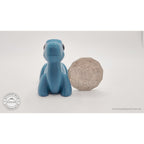 Blue Baby Brontosaurus 3D printed articulated fidget toy shown upright front view with Australian 50 cent coin for scale — Sensory Sidequest Australia
