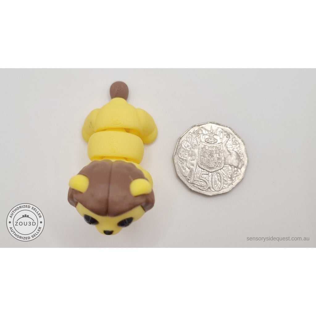 Yellow and brown Baby Lion 3D printed articulated fidget toy shown with Australian 50 cent coin for scale — Sensory Sidequest Australia