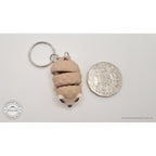 Baby Hedgehog keychain variant next to Australian 50c coin for size reference — own photo by Sensory Sidequest