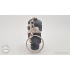 Tiny Dracula keychain articulated toy — side view showing figure and key ring attachment, own photo by Sensory Sidequest