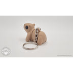 Baby Capybara smooth keychain — rear view showing chain attachment to body