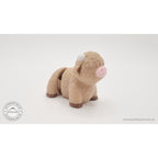 Baby Highland Cow 3D printed fidget toy shown beside an Australian 50 cent coin to show size — Sensory Sidequest