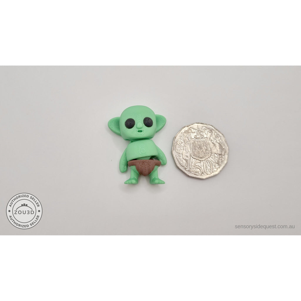 Tiny Goblin 3D printed toy next to Australian 50-cent coin showing small scale