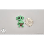 Tiny Goblin 3D printed toy next to Australian 50-cent coin showing small scale