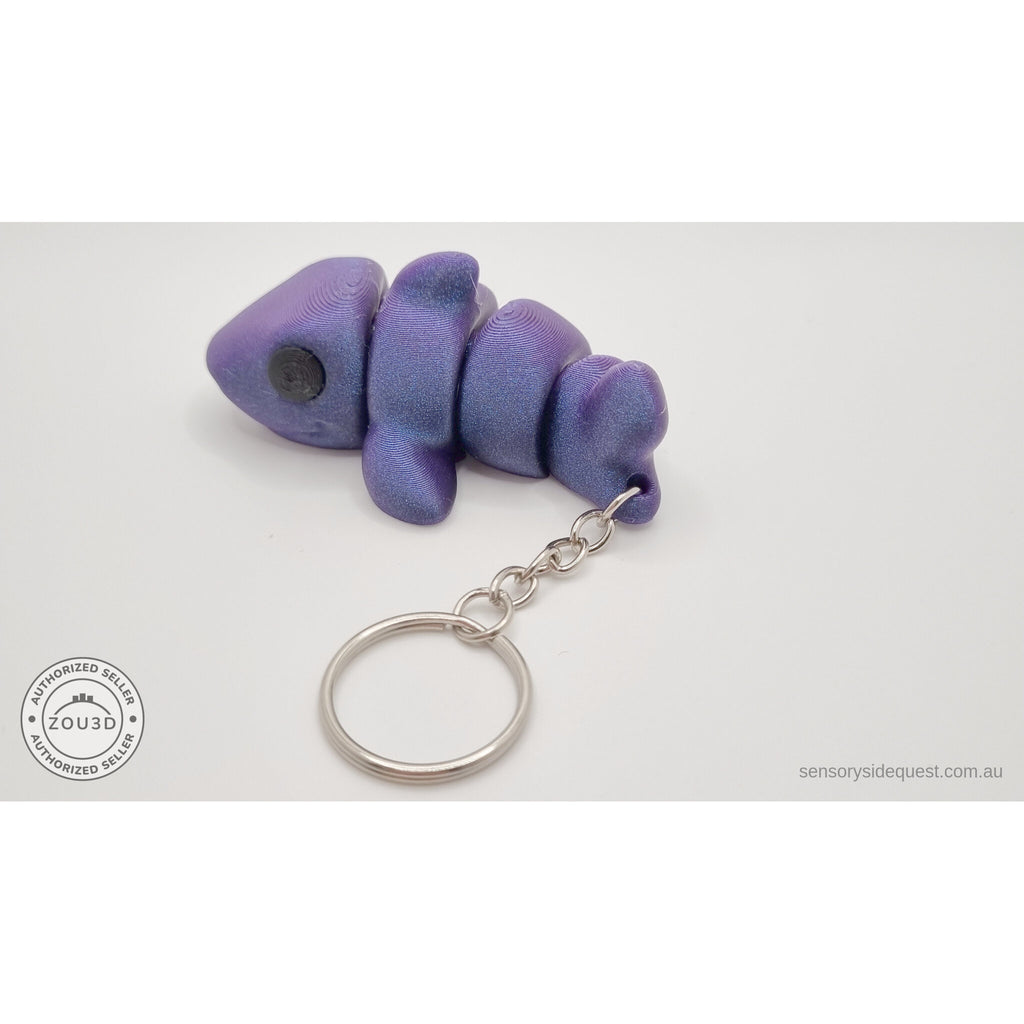 027-TNYSHK Tiny Shark keychain in crushed electric purple — rear view showing tail-first orientation and keychain chain hanging below — 3D printed articulated fidget toy by Sensory Sidequest