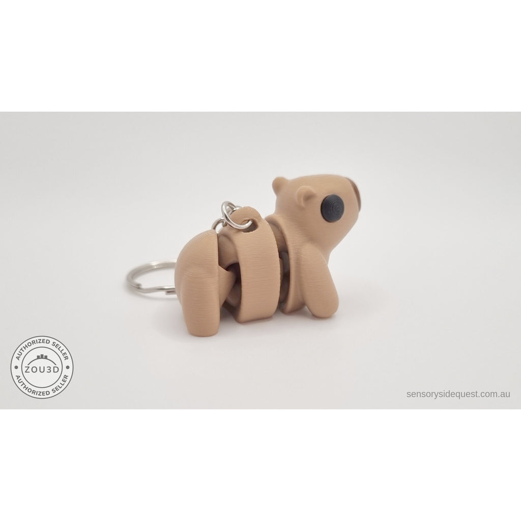 Baby Capybara smooth keychain — side view showing chain hardware along body