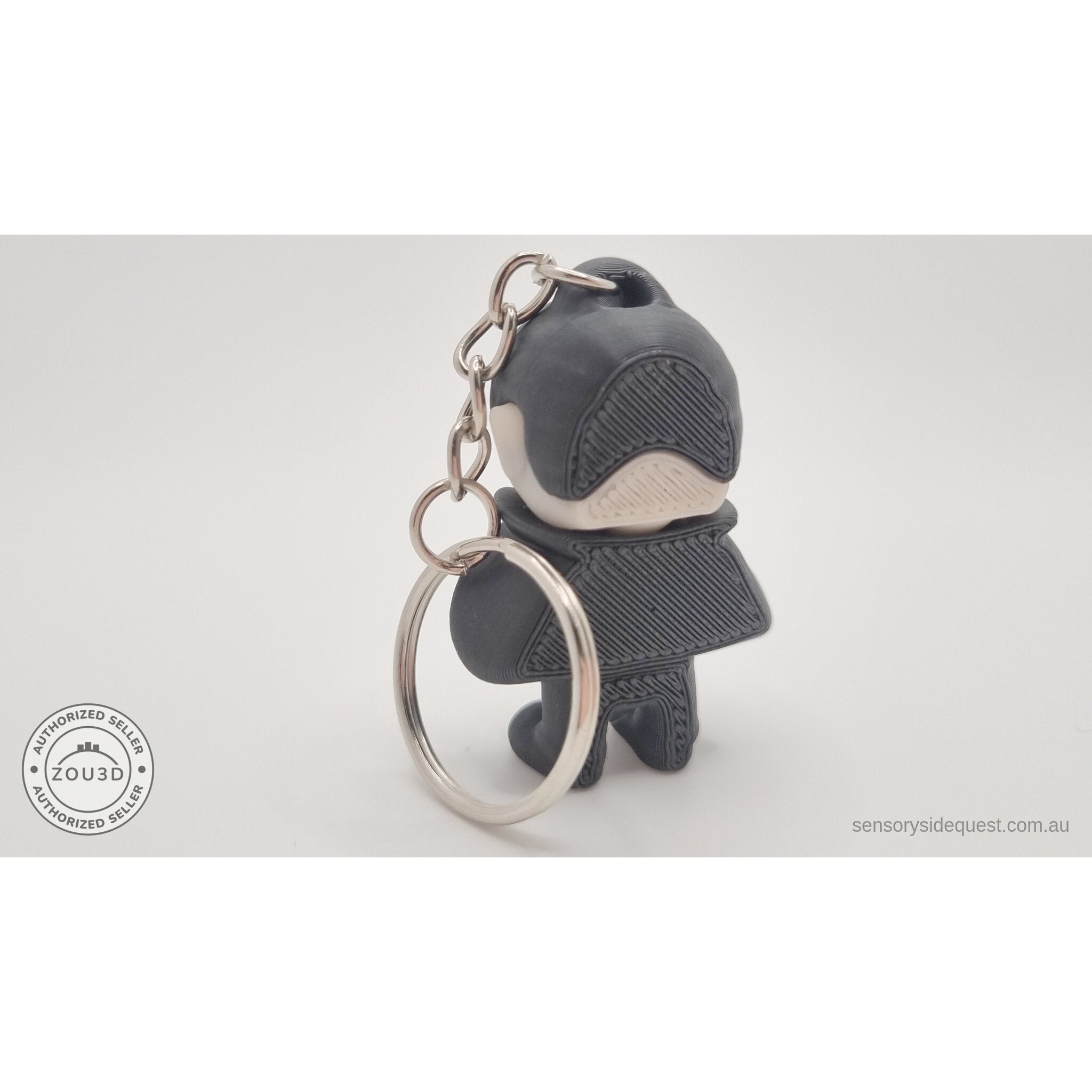 Tiny Dracula keychain variant — rear view showing back and ring detail, own photo by Sensory Sidequest