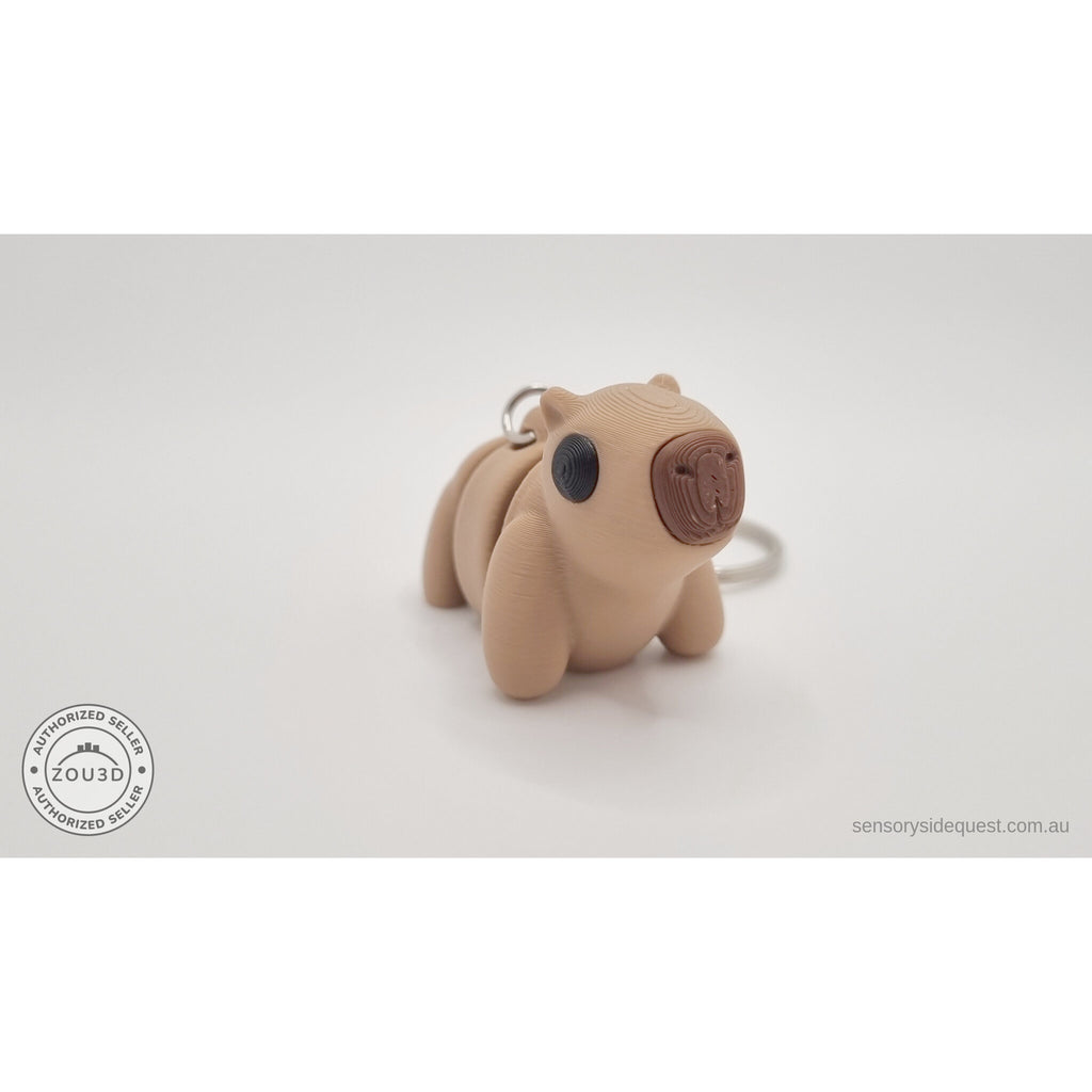 Baby Capybara smooth keychain — three-quarter front view showing full body and ring
