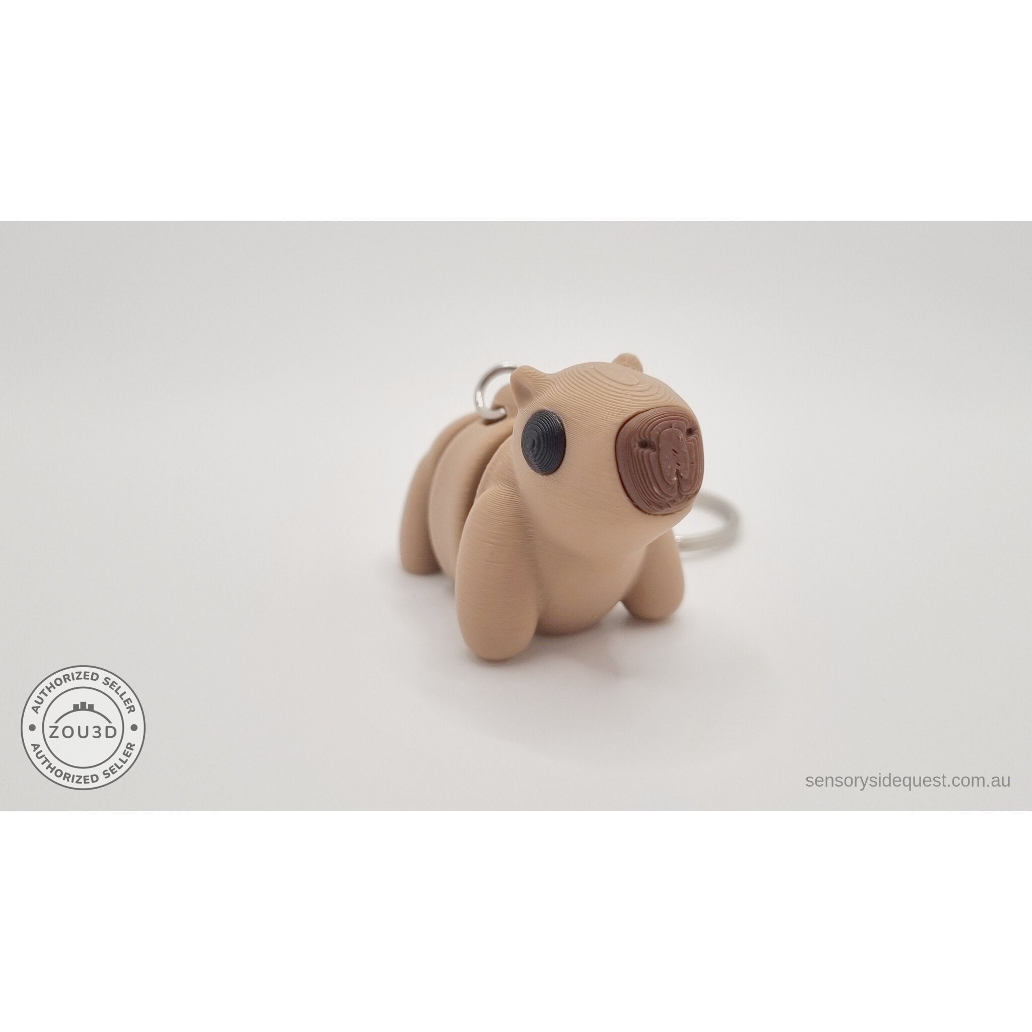 Baby Capybara smooth keychain — three-quarter front view showing full body and ring