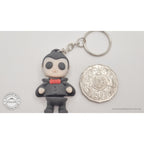 Tiny Dracula keychain variant next to Australian 50c coin for size reference — own photo by Sensory Sidequest