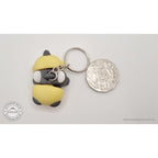 Baby Bee keychain beside Australian 50 cent coin — scale reference