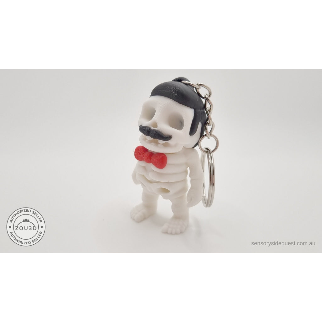 Mr.Skeleton Freddie Mercury keychain variant leaning 3/4 pose showing keychain ring and chain — 3D printed articulated fidget toy by Sensory Sidequest