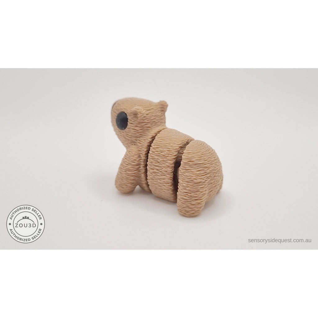 Baby Capybara fuzzy finish — sitting side view showing textured body and articulation