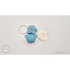 Blue Baby Elephant 3D printed keychain toy next to 50c coin for size reference