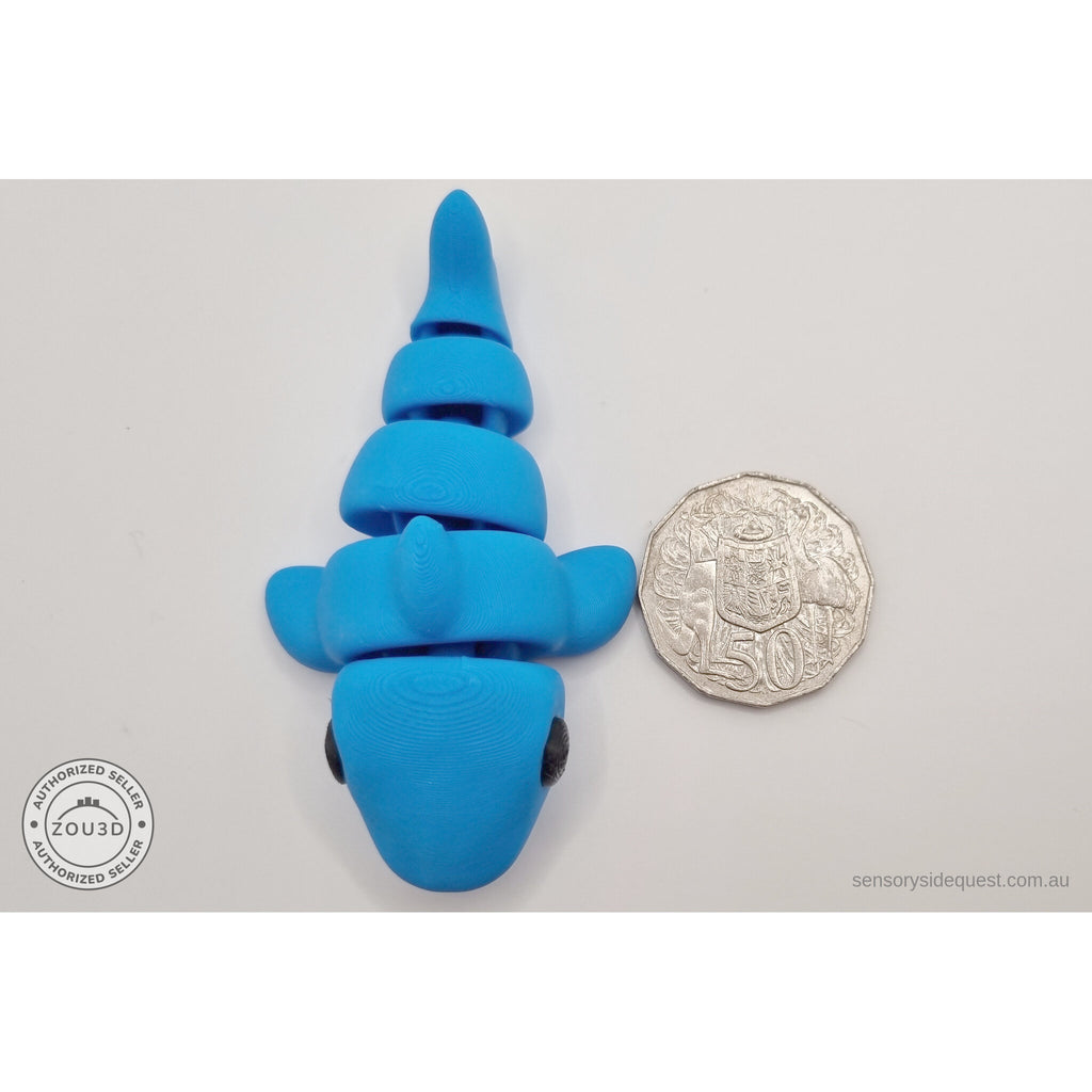 024-SHK Baby Shark in cyan matte, overhead scale reference beside Australian 50 cent coin — 3D printed articulated fidget toy by Sensory Sidequest