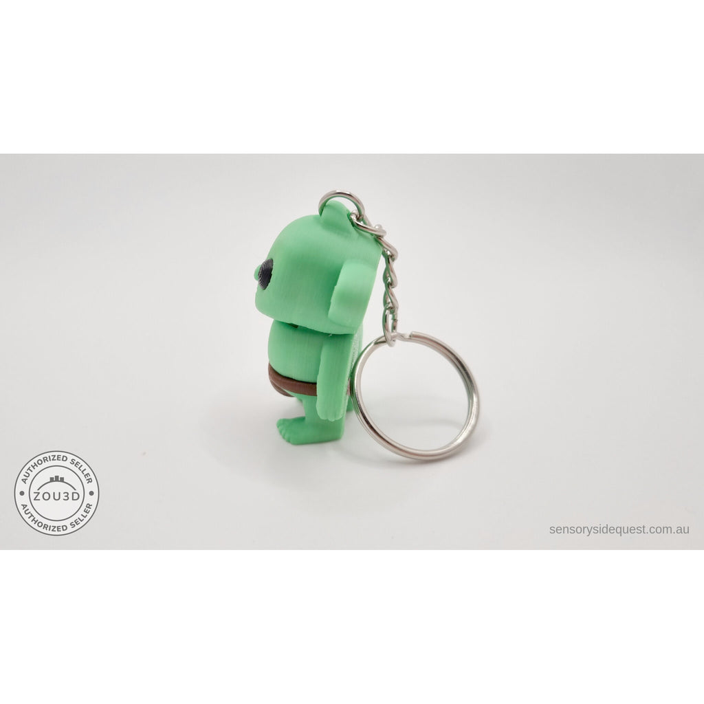 Tiny Goblin ZOU3D keychain — side-back view showing chain attachment