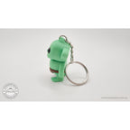 Tiny Goblin ZOU3D keychain — side-back view showing chain attachment