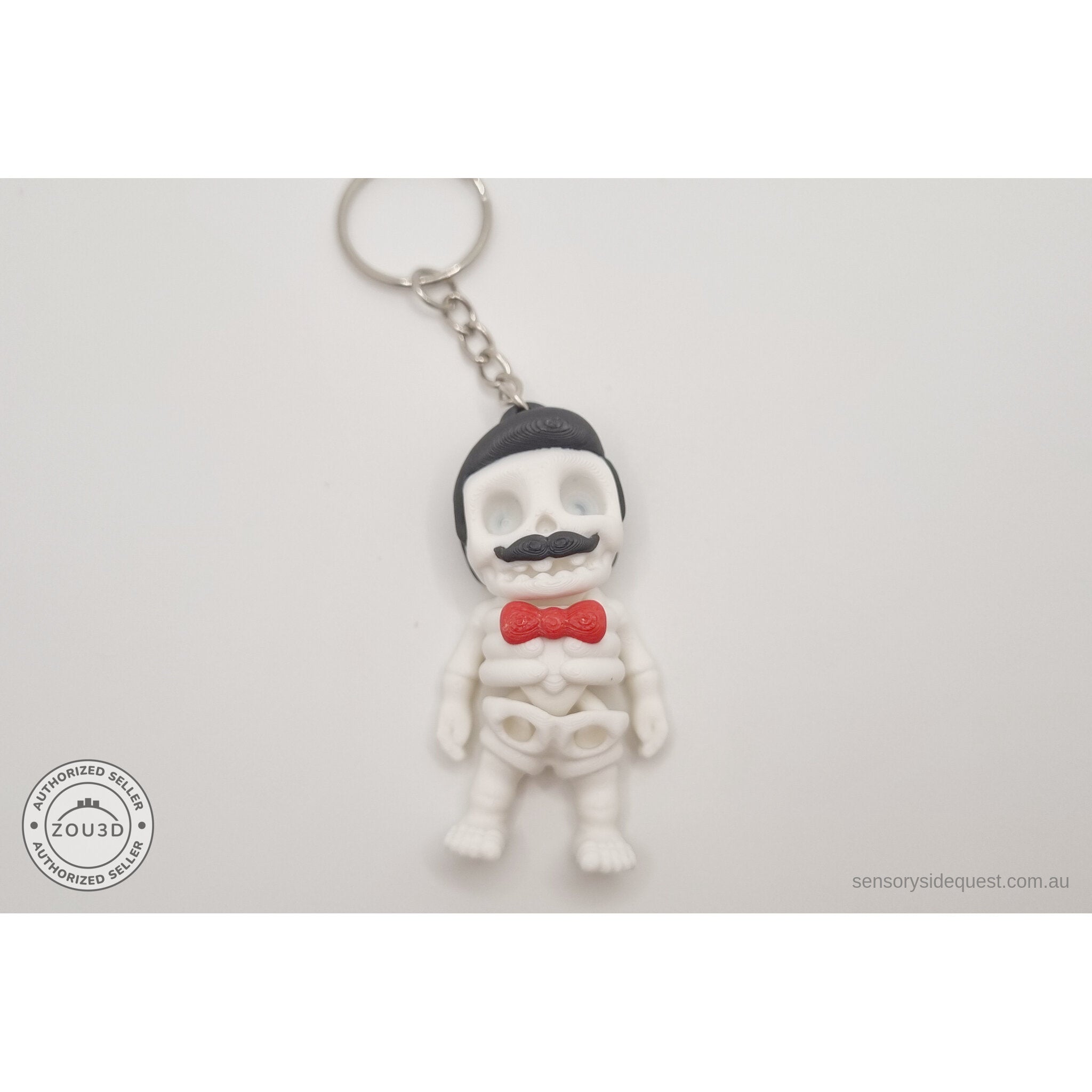 Mr.Skeleton Freddie Mercury keychain variant flat front showing full figure with keychain attachment — 3D printed articulated fidget toy by Sensory Sidequest
