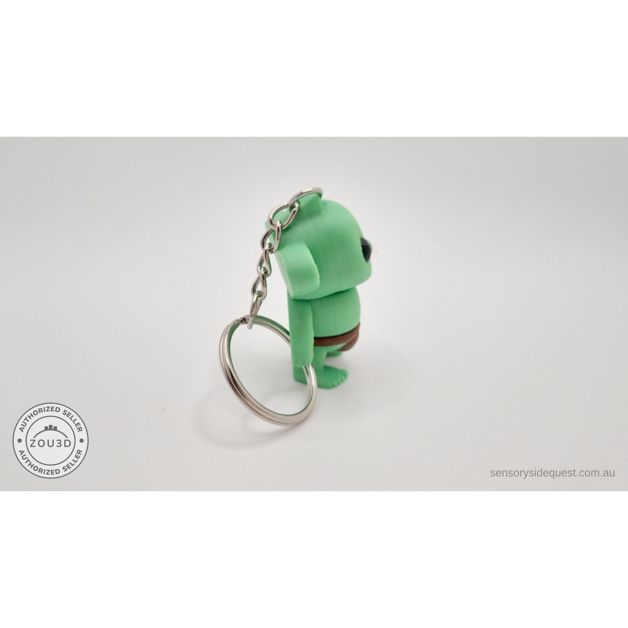 Tiny Goblin ZOU3D keychain — back angle view with keyring