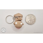 Baby Highland Cow keychain and standard variant 3D printed articulated fidget toys shown side by side — Sensory Sidequest Australia