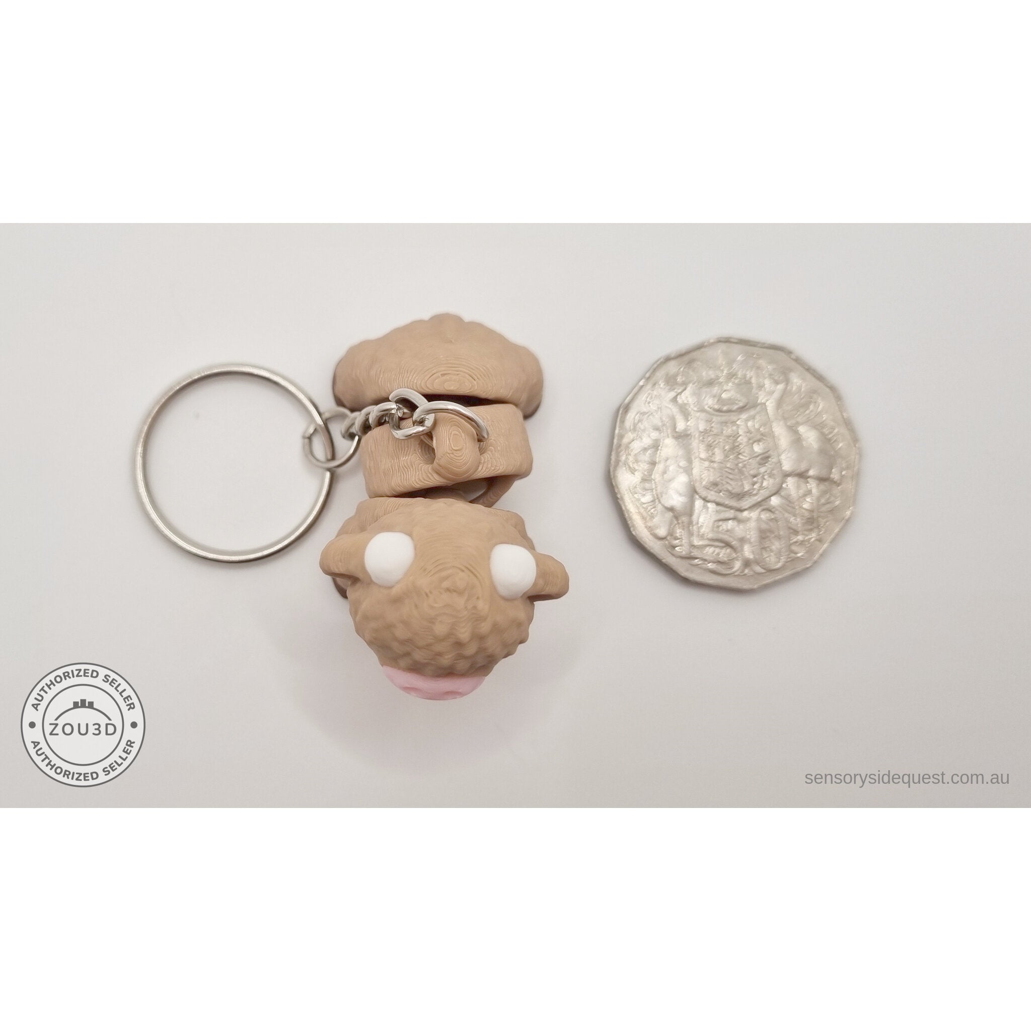 Baby Highland Cow keychain and standard variant 3D printed articulated fidget toys shown side by side — Sensory Sidequest Australia