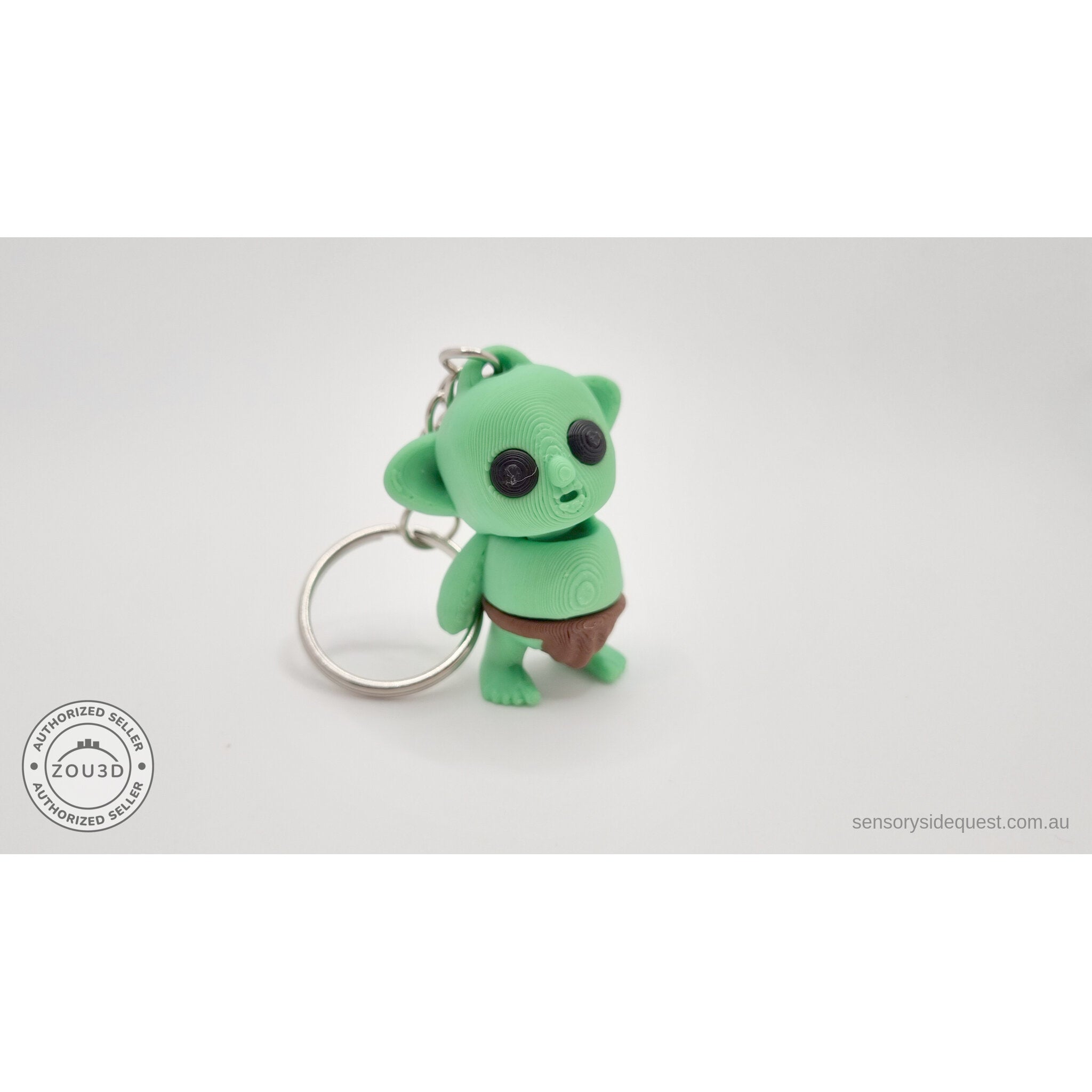 Tiny Goblin ZOU3D keychain — 3/4 front view showing goblin face and ring