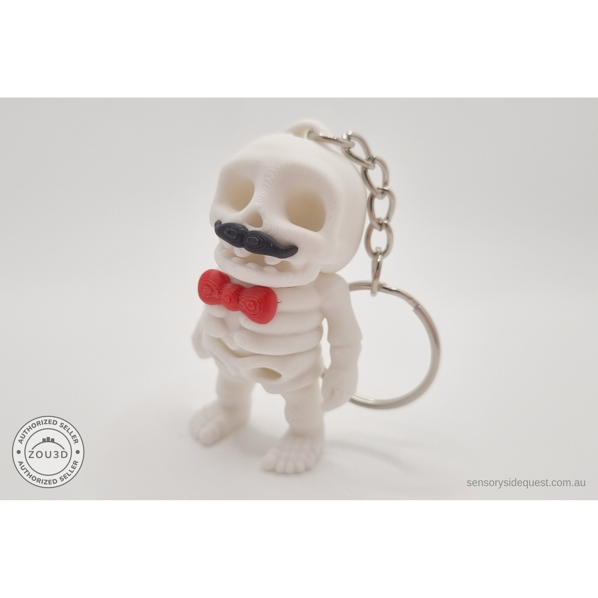 Mr.Skeleton Moustache keychain variant front closeup showing moustache and bow tie detail — 3D printed articulated fidget toy by Sensory Sidequest