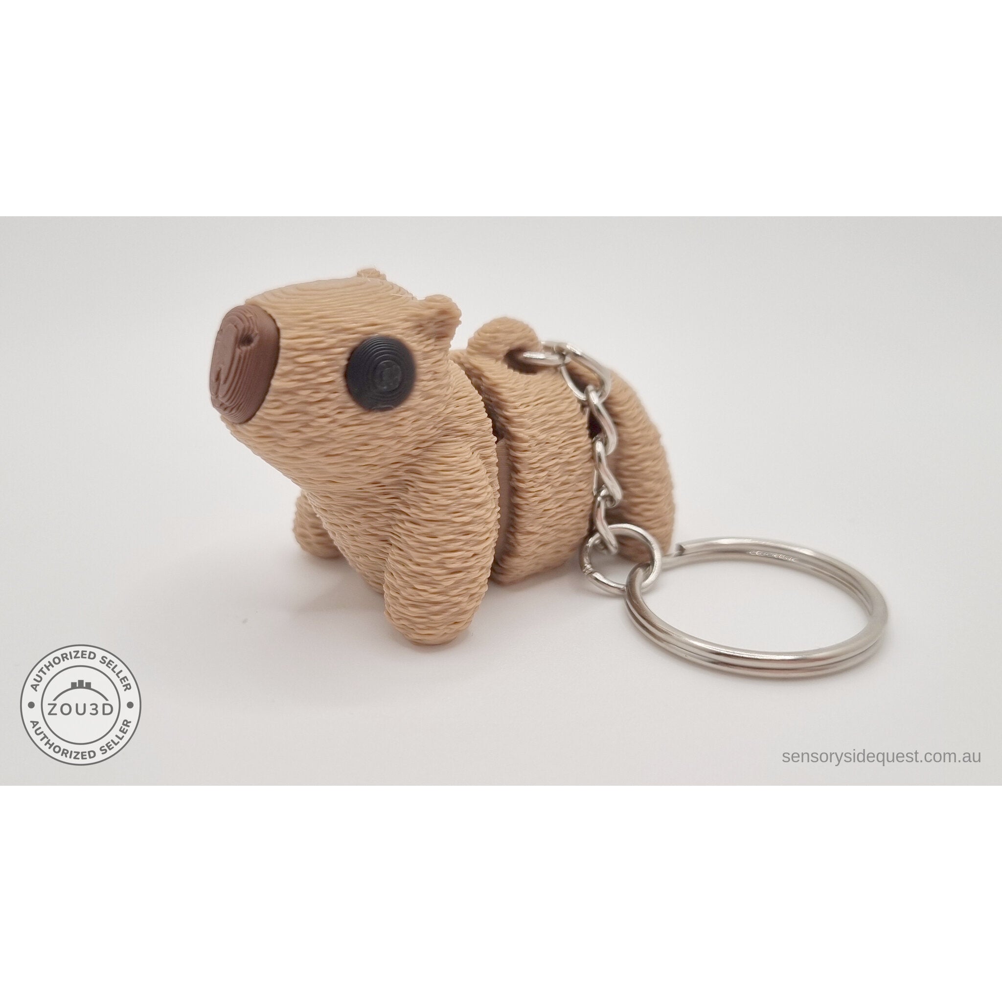 Baby Capybara fuzzy keychain — front three-quarter view showing textured surface and chain