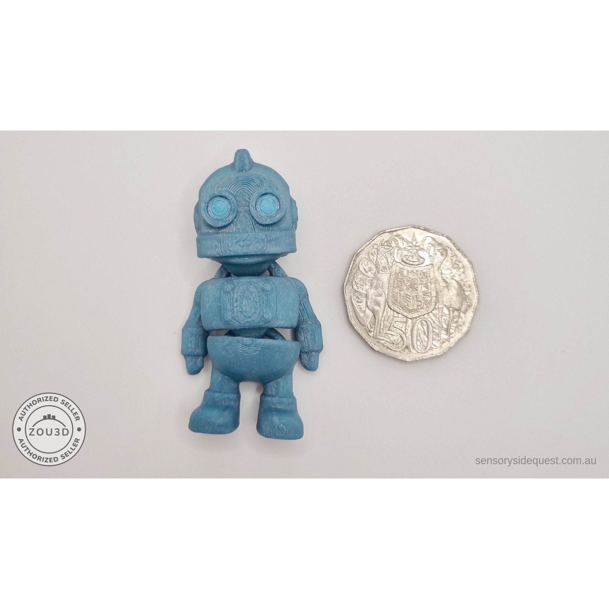 Tiny Robot 3D printed fidget toy in teal beside Australian 50 cent coin — scale reference showing compact palm-sized figure — Sensory Sidequest