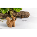 Sensory Sidequest Baby Squirrel 3D printed articulated fidget toy in warm golden-brown, front-left three-quarter view showing upright pose and arching sculptured tail