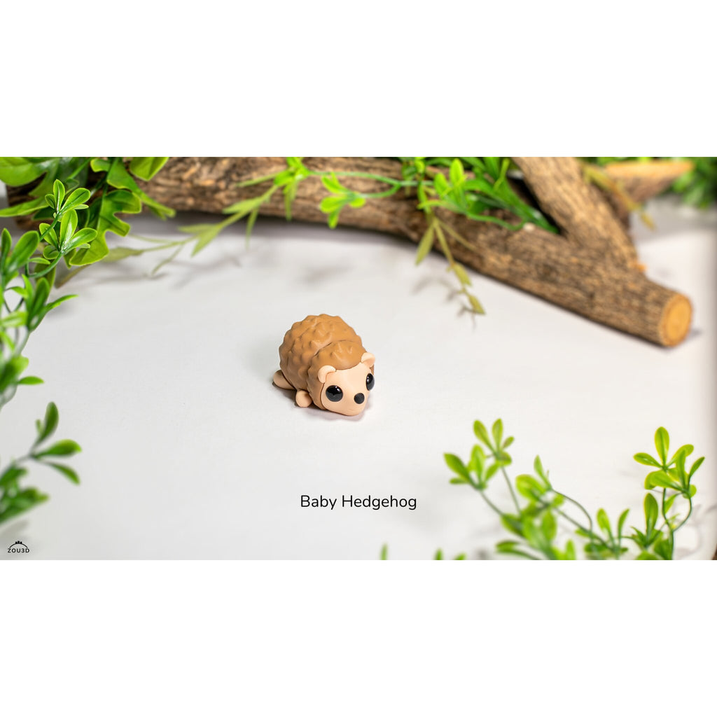 Sensory Sidequest Baby Hedgehog articulated 3D printed fidget toy — three-quarter front view showing full body and quill texture detail