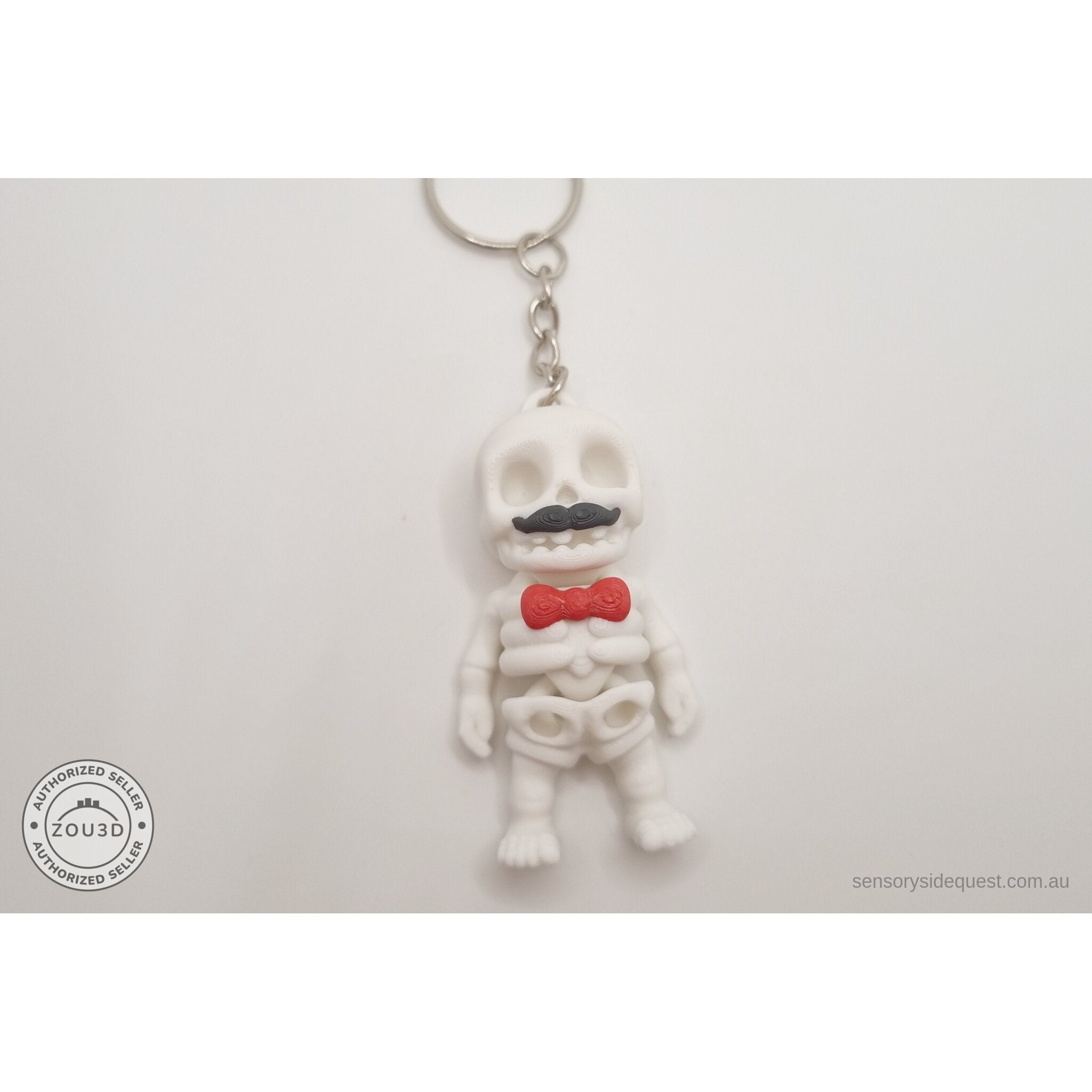 Mr.Skeleton Moustache keychain variant flat front showing full figure with keychain attachment — 3D printed articulated fidget toy by Sensory Sidequest