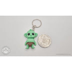 Tiny Goblin ZOU3D keychain next to Australian 50-cent coin for scale