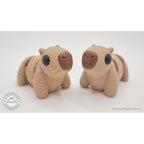 Baby Capybara smooth and fuzzy variants side by side — group shot showing both finishes