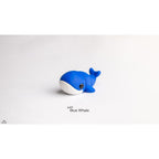 Baby Blue Whale Zou3D articulated toy — front-facing three-quarter angle showing expressive eye and blue body