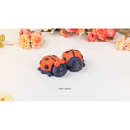 Baby Ladybug ZOU3D stock render — three-quarter view showing red elytra and navy body