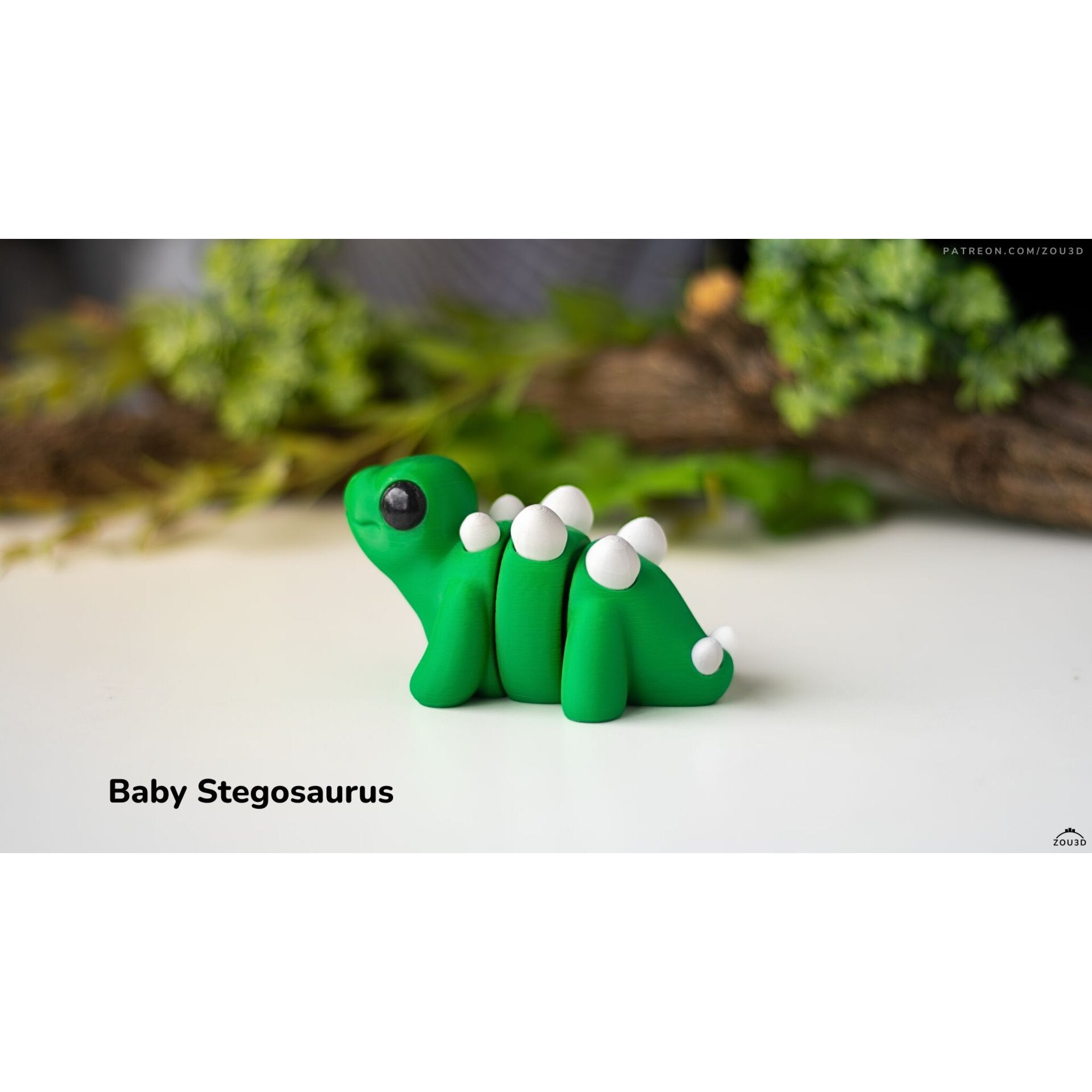 Green Baby Stegosaurus 3D printed articulated fidget toy by Sensory Sidequest