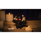 Black Tiny Bat articulated fidget toy with vivid eyes by Sensory Sidequest