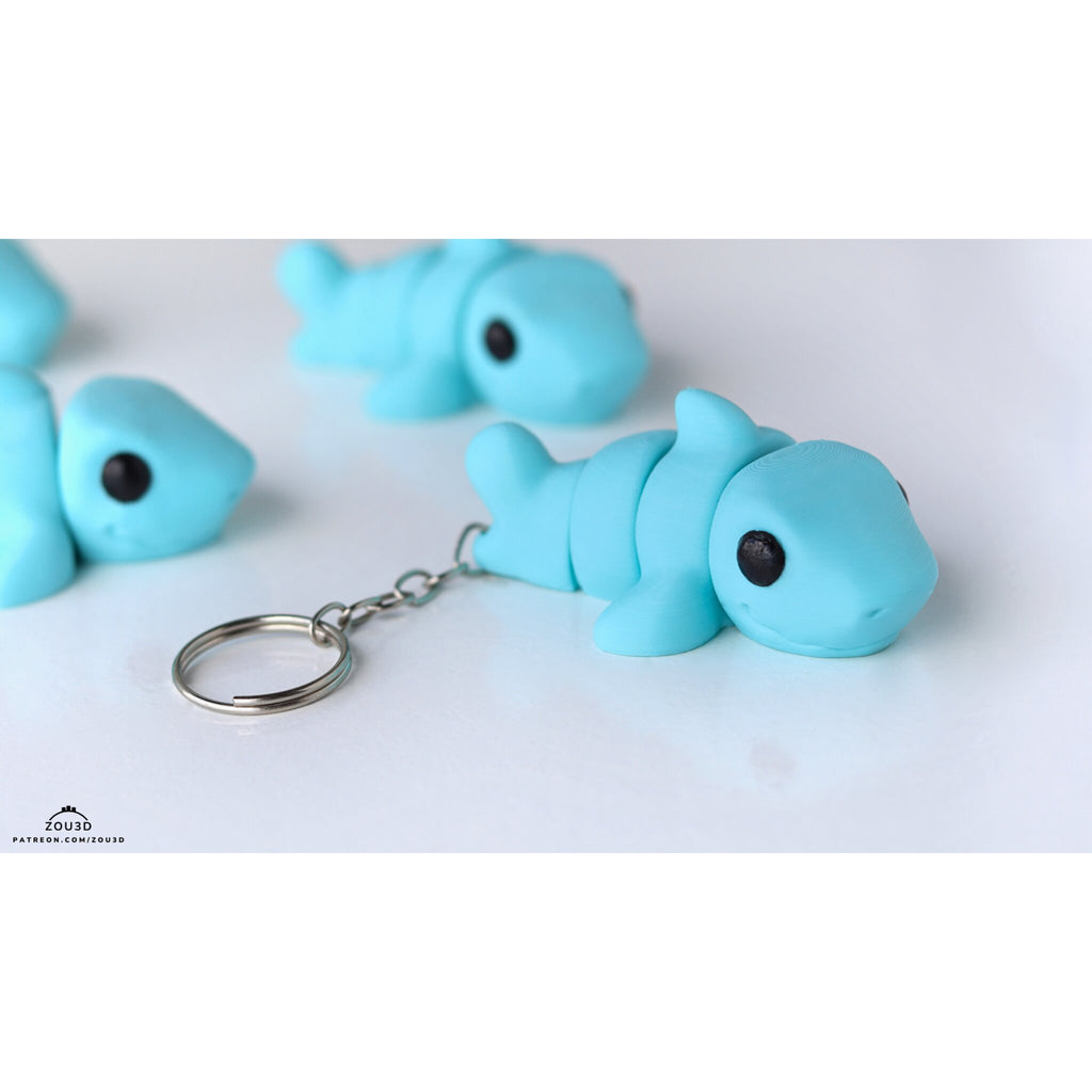 027-TNYSHK Tiny Shark — designer stock render, close-up 3/4 front view with multiple units in background, showing face detail and scale — by Zou3D
