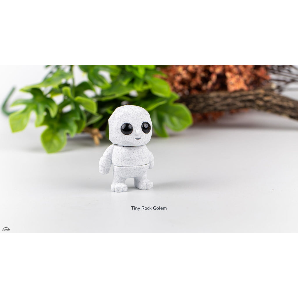 White granite Tiny Rock Golem 3D printed articulated fidget toy by Sensory Sidequest