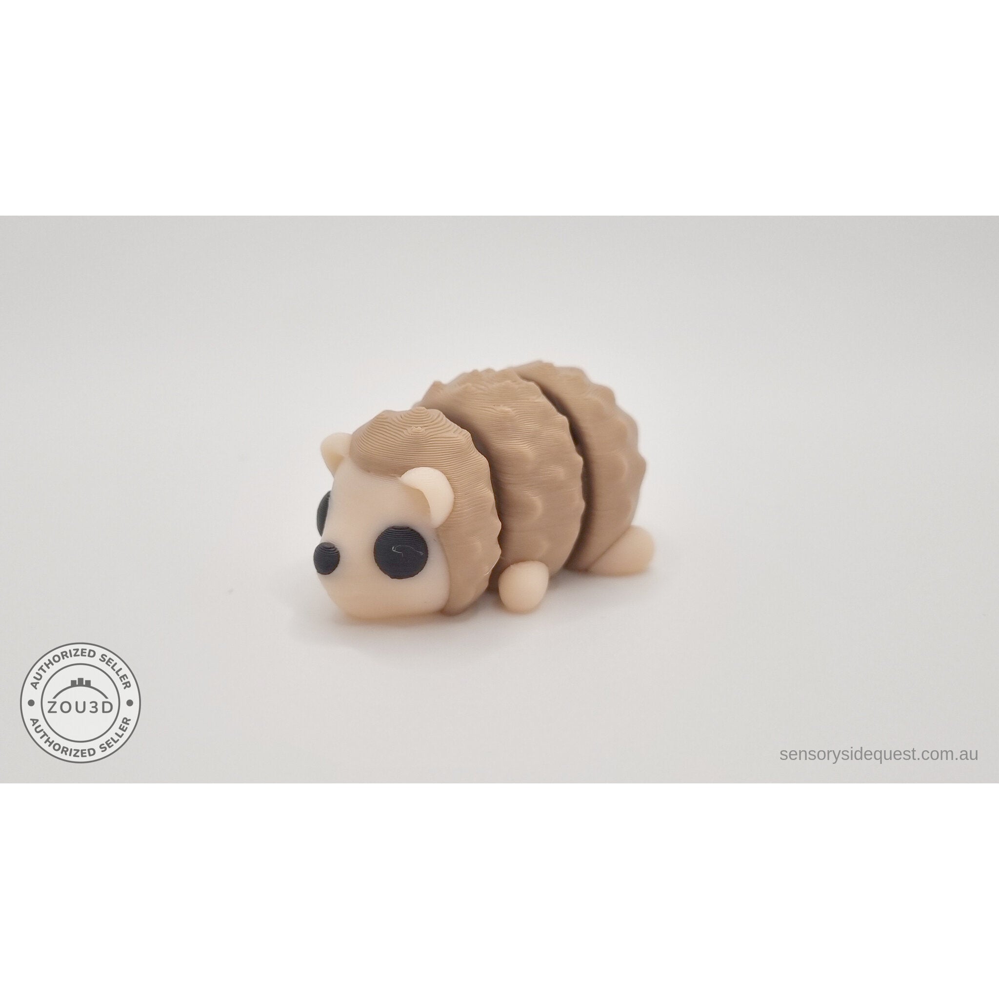 Baby Hedgehog articulated 3D printed toy — 3/4 front view showing face, legs, and quill texture, own photo by Sensory Sidequest