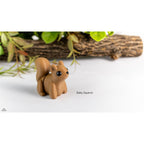 Baby Squirrel Zou3D 3D printed articulated toy, frontal face-on view highlighting large black eyes and rounded features