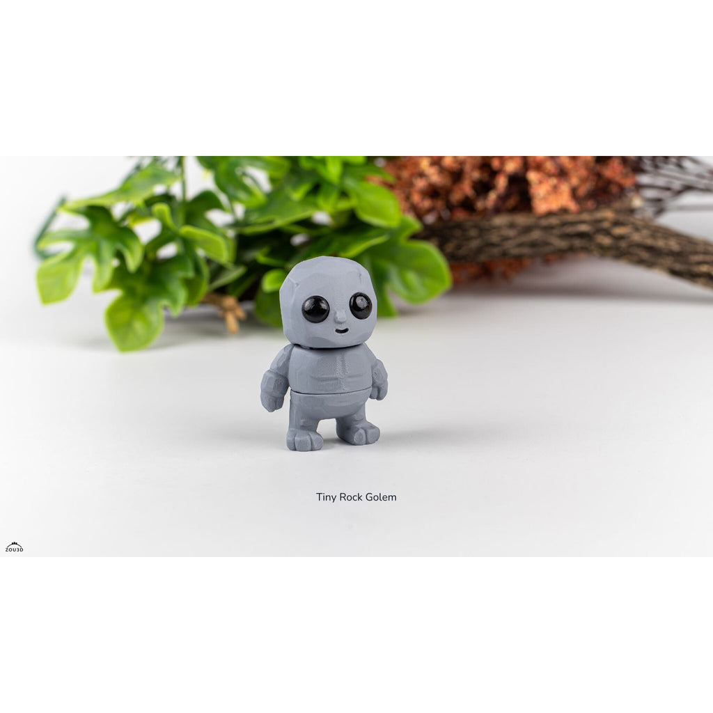 Grey Tiny Rock Golem 3D printed articulated fidget toy by Sensory Sidequest