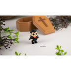Tiny Dracula articulated Zou3D figure close-up showing cape detail and full body articulation with coffin backdrop