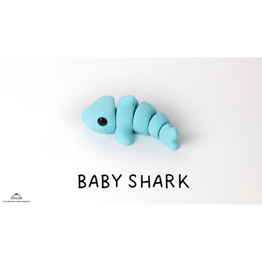 Zou3D Baby Shark articulated fidget toy — official stock render, top-down view with BABY SHARK title