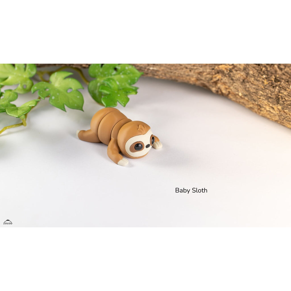 Baby Sloth 3D printed articulated figure — side angle showing body segments and extended arm