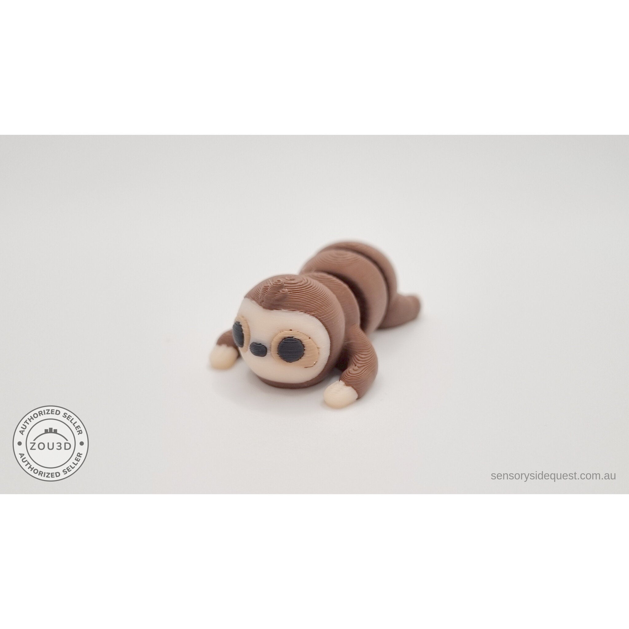 Baby Sloth 3D printed articulated fidget toy — 3/4 front view showing face, cream mask, and long arms, own photo by Sensory Sidequest