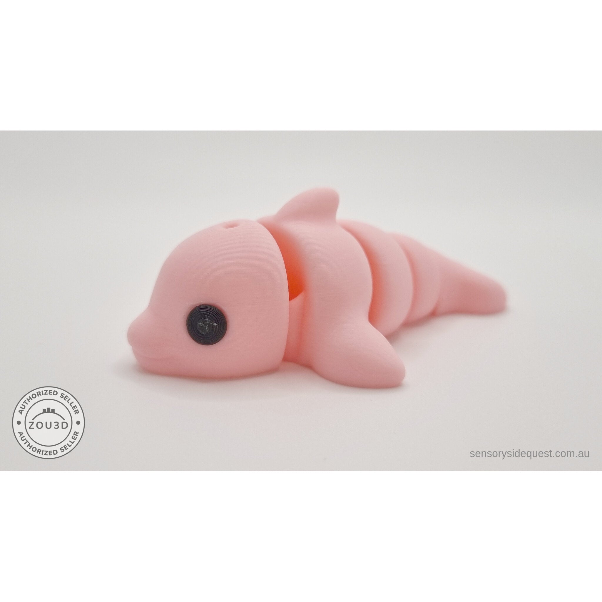 Pink Baby Dolphin 3D printed articulated fidget toy — side profile showing full body and articulation joints — Sensory Sidequest Australia